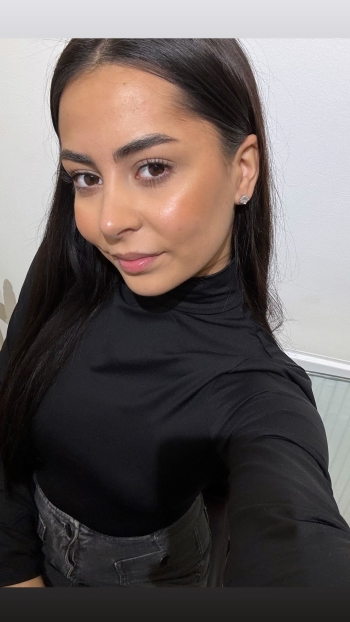 Fresh, natural selfie with a relaxed and genuine smile.