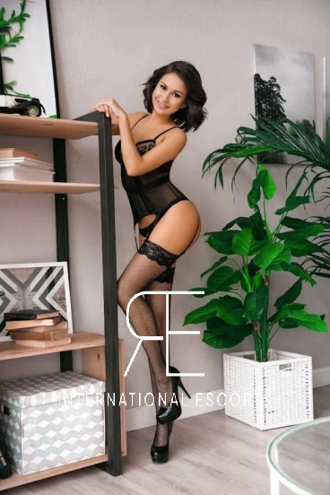 Ariadna looks very sexy in black lingerie and high heels 