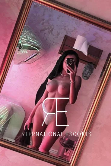 Kara took this topless mirror selfie for her profile 
