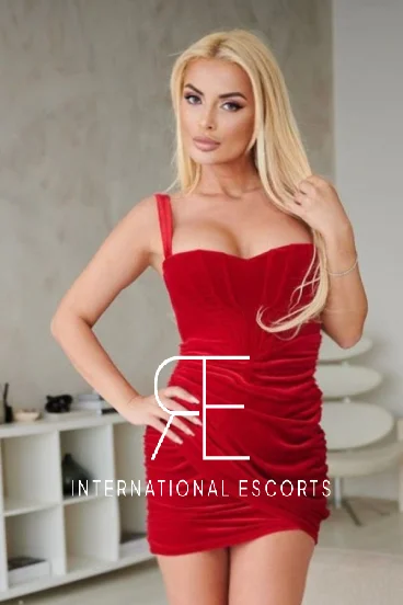 Red dress profile picture of London escort Shelby 