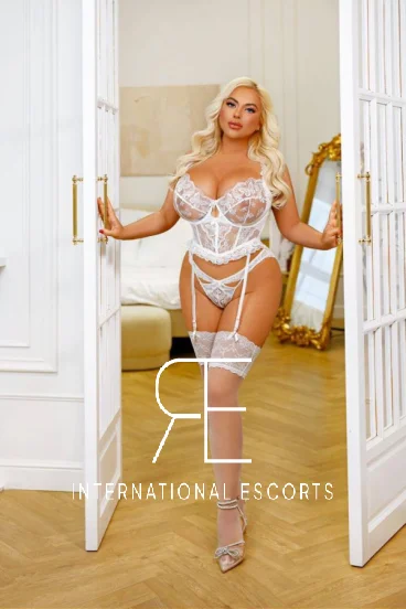 In this photo Adeila is wearing sexy white lace lingerie 