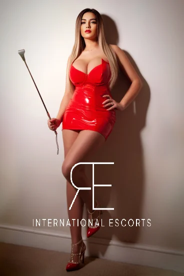 Sexy blonde lady pictured wearing red latex 