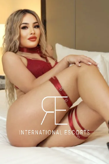 A profile picture of a sexy busty blonde escort named Cali 