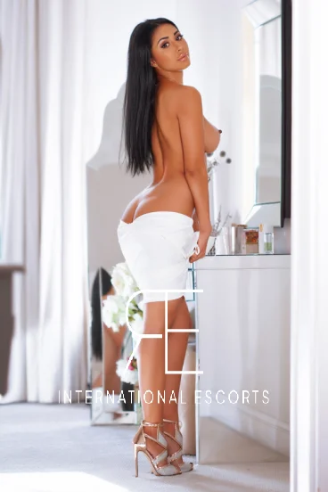 Snow is taking off her white sexy dress 