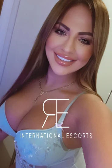 A selfie profile picture of a London escort named Olia