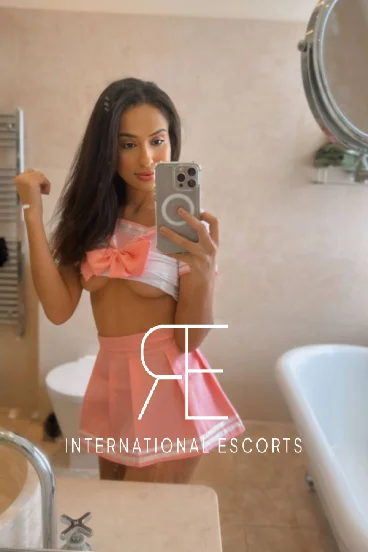 Luisa looks very sexy dressed in a pink cheerleader outfit 
