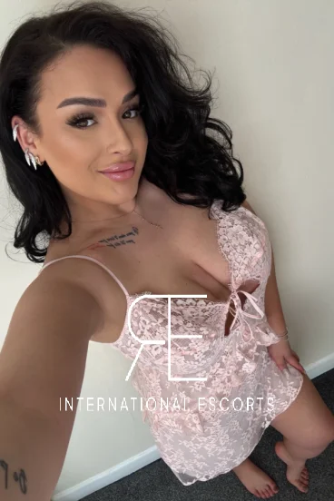 Sugar is wearing pink lingerie 