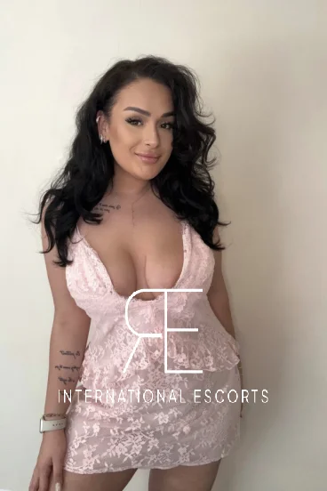 A busty brunette escort named Sugar