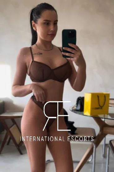 Slim sexy brunette woman pictured dressed in a sexy bikini 