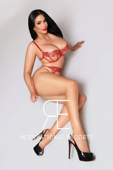 Pamela is laying on the floor looking sexy 
