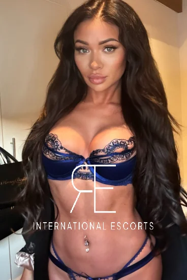 A busty brunette model escort 