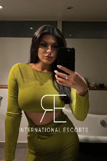 Cleo olive dress selfie, stylish elite party escort