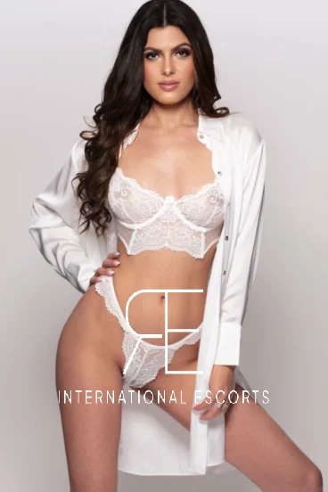 Cleo in silk shirt and white lace, curves of a Brazilian escort