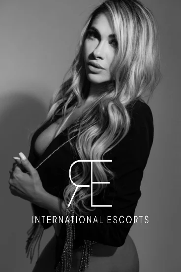 Mara Brazilian international escort, blonde beauty in black jacket, London GFE