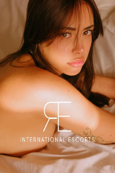 Sophisticated brunette Lisa-May in lace lingerie, global escort companion