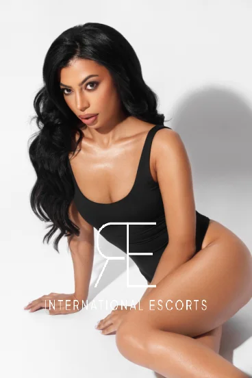 Sophisticated brunette Mannu, international beauty with allure