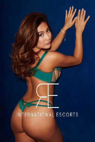 Autum, emerald lingerie elegance, international Asian brunette companion.