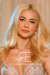 A profile picture of a blonde London escort named Slyvia 